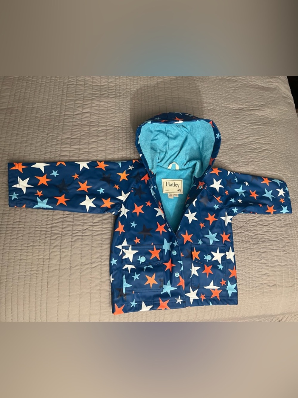 Hatley Navy Star Rain Jacket with Orange & Light Blue Stars 2T